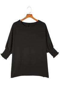 Women Black Smocked Wrist Shift Top. (SPI)